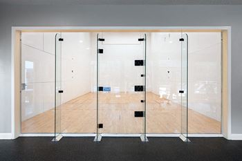 Indoor racquetball court with equipment available for use
